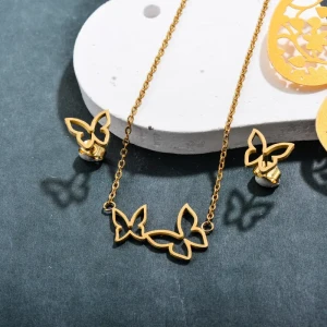 Conjunto dorado mariposas