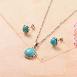Conjunto plateado con turquesa