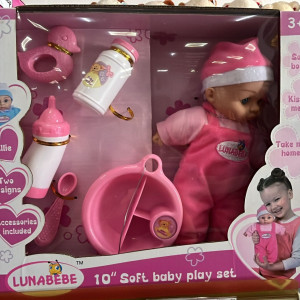 Muñeca con accesorios  