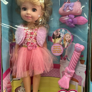 Muñeca con accesorios  
