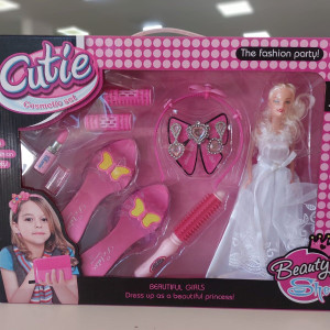 Muñeca con accesorios  