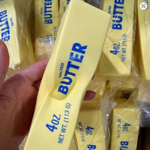 UGUETE ANTIESTRES ELASTICO BARRA DE MANTECA 4OZ / 113G